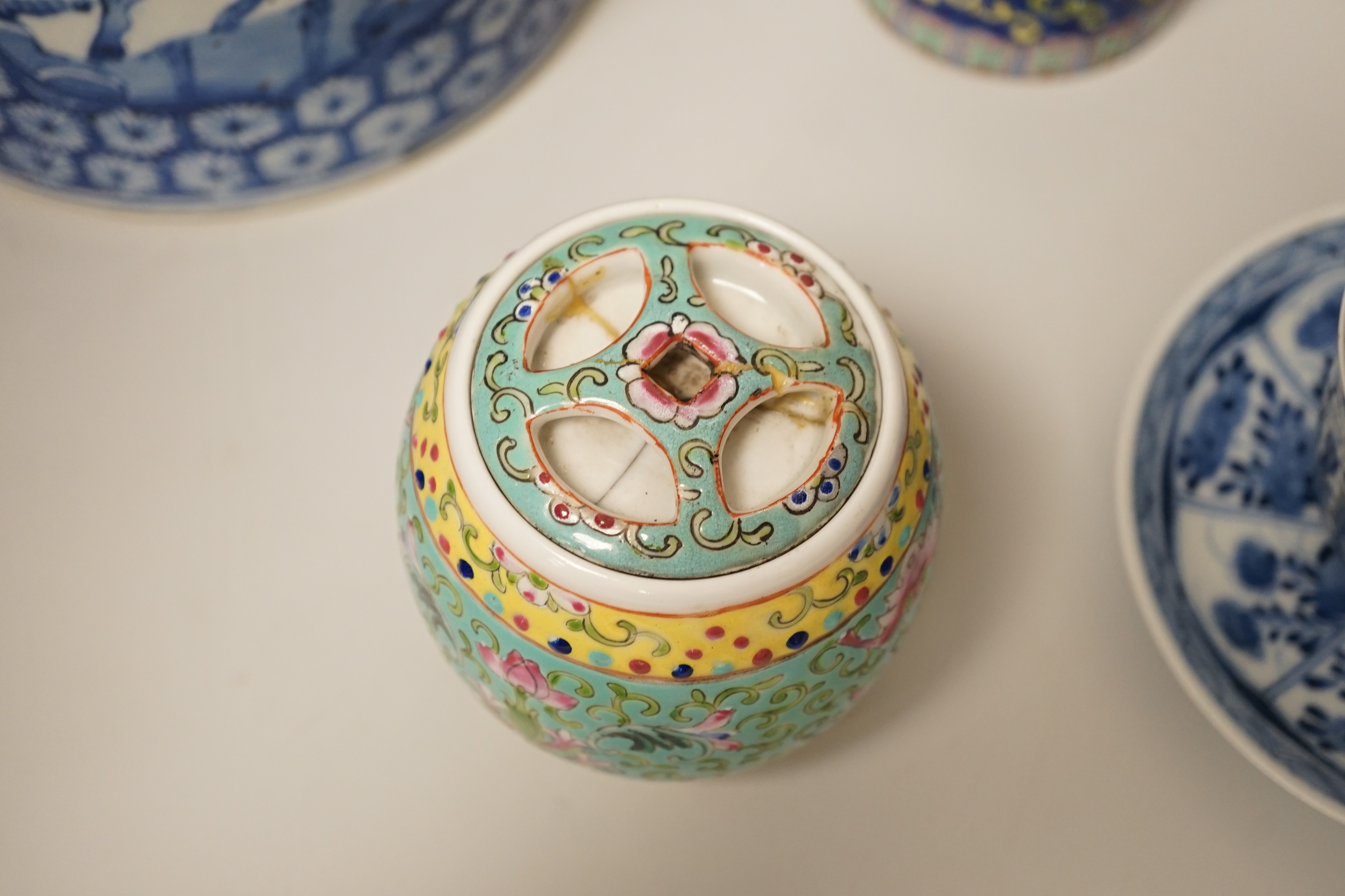 A Chinese blue and white brushpot, enamelled jar, brush pot, famille verte jar cover and a Japanese blue and white tea bowl and cover. Tallest 18cm